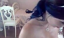 Oily body beauty passionately deepthroats a fake cock on cam, showcasing her solo skills with toys