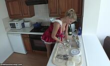 Blonde girlfriend chooses red outfit and does the dishes