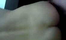 Dark-haired gal holding onto the wall while being fucked doggystyle in front of a mirror