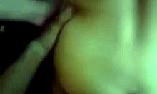 Dark-haired gal holding onto the wall while being fucked doggystyle in front of a mirror