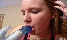 Athletic Red-Haired Bimbo Starts Licking Her Long Blue Dildo On Webcam