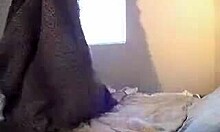 Sleepy redhead in pigtails vibrates her pussy on bed