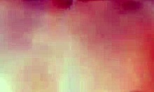 Does this brunette girlfriend use her boobs to jack off her partner?