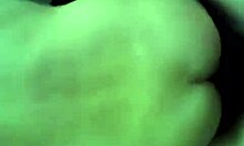 Dark-haired gal holding onto the wall while being fucked doggystyle in front of a mirror