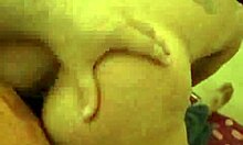 this exotic busty chick is squeezing her big tits while grinding