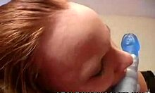 Athletic Red-Haired Bimbo Starts Licking Her Long Blue Dildo On Webcam