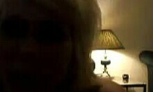 Slutty platinum blonde strips naked, teasing on webcam in thong.