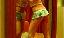 Leggy teen strips butt naked in bedroom mirror