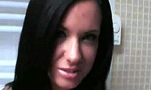 brunette in shower shows off her curves