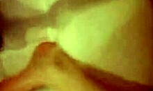 is this slut in the bath touching her shaved pussy while thinking about porn?