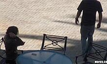 This fabulous curly brunette waits for her boyfriend in the cafe garden, riding in pov