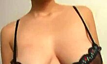 innocent brunette in see-through lingerie enjoys a relaxing session with her partner