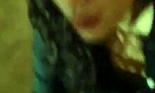 Curly haired honey needs a penis in public on her knees