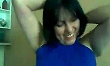 Pretty mature brunette model showcases her natural figure on webcam.