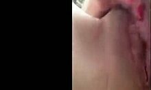 Hey, watch this attractive hottie playing with her trimmed pussy!