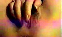 girl with red nails fingers her unshaved pink pussy
