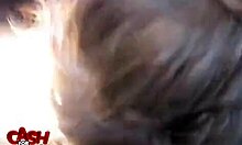 Exotic woman in sunglasses performs in car