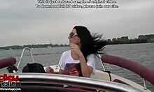 Sexy brunette with fake tits masturbates and flashes on boat, ending with cum on ass