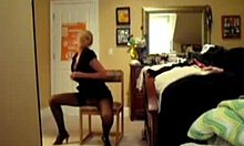 desirable blonde exposing alluring body in naughty stripping