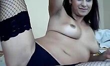 Watch this sexy four-eyed babe in fishnets tease herself?