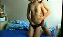 Pig-tailed brunette feels slammed in doggystyle by partner