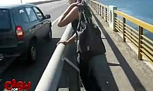 Exotic woman in sunglasses performs in car