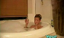 Eighteen-year-old blonde bimbo explores hardcore fantasies in the bath
