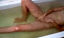 Redhead bathes in bathroom after intimate encounter