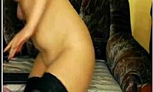 i'm this sexy brunette milf toying my shaved pussy with a dildo on webcam