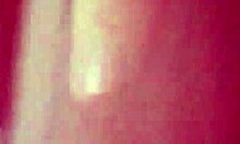 brunette gf in stockings fingers her twat on bed