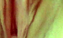 brunette gf in stockings fingers her twat on bed