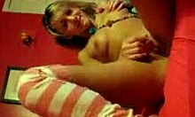 cute blonde in miniskirt on webcam starts touching herself gently