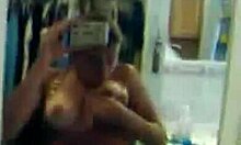 Naughty teen with natural tits undresses in mirror for solo show