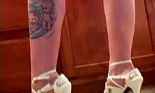 Blonde With Tattoo Teases In See-Through Panties.