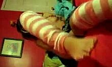 cute blonde in miniskirt on webcam starts touching herself gently