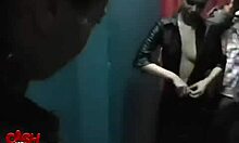 Brunette in glasses films herself getting fingered on bed