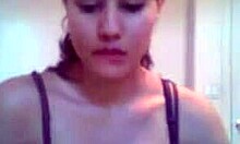 young bimbo on webcam slowly strips her thong, waiting for that hot affair with natural tits bouncing.