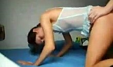 black-haired cutie moans as she's fucked doggystyle