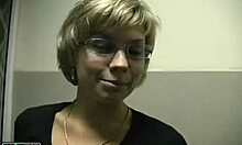 Hey, that blonde with glasses is stripping and getting ready for some pounding action.