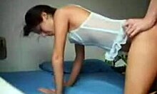 black-haired cutie moans as she's fucked doggystyle