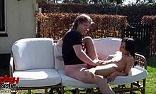 Outdoor gf sex in the garden, slutty chick with fake tits gets smacked from behind in doggystyle.