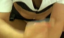 A bimbo in stockings gives a classy handjob in a homemade scene.