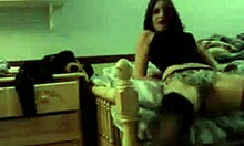 quite fashionable goth babe undresses in stockings and panties