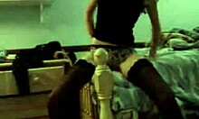 quite fashionable goth babe undresses in stockings and panties