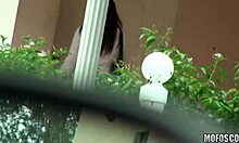 Horny petite babe spies on milf sucking cock in bed.