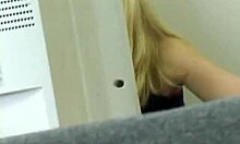 Blonde bimbo spreads hairy pussy in office voyeur scene