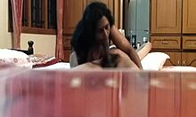 This skanky Indian babe is munching on a thick dick in the kitchen. She's sucking it with horny enthusiasm.