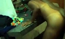 a tanned indian couple shares intimate homemade moments together