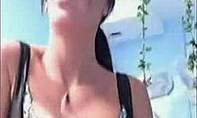 amazing brunette babe with piercing and thong teases on webcam solo