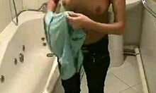 Oh god, this brunette hoe moans loudly while masturbating in the bath!